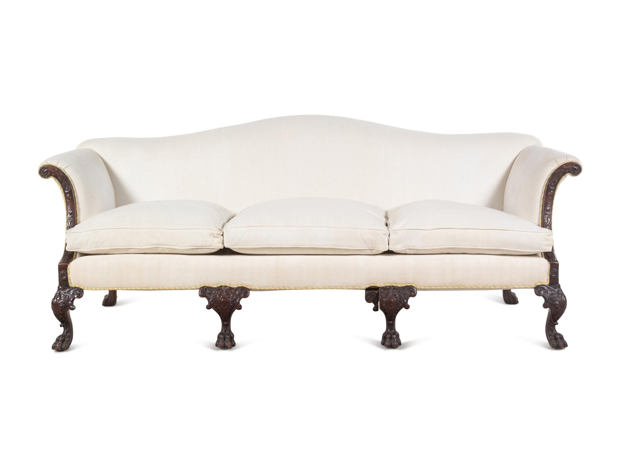 A George I Style Carved Mahogany Camelback Sofa