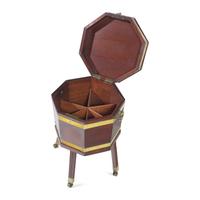 A George III Octagonal Brass-Bound Mahogany Cellarette