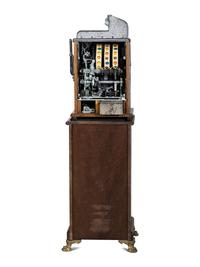 A Mills Novelty Co. Castle Front 50 Cent Slot Machine on Chief's Head Engraved Glass Stand