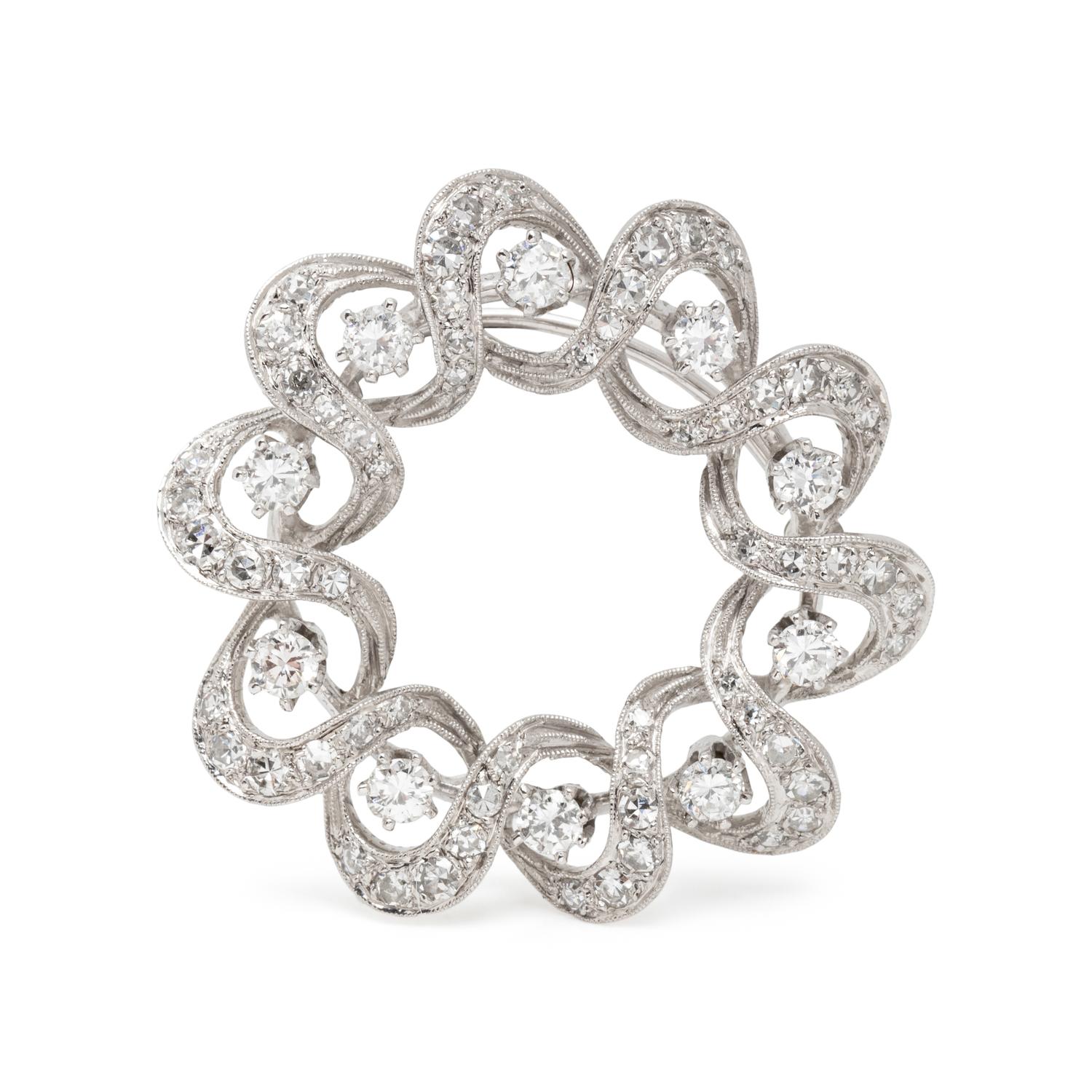PLATINUM AND DIAMOND CIRCLE BROOCH/PENDANT