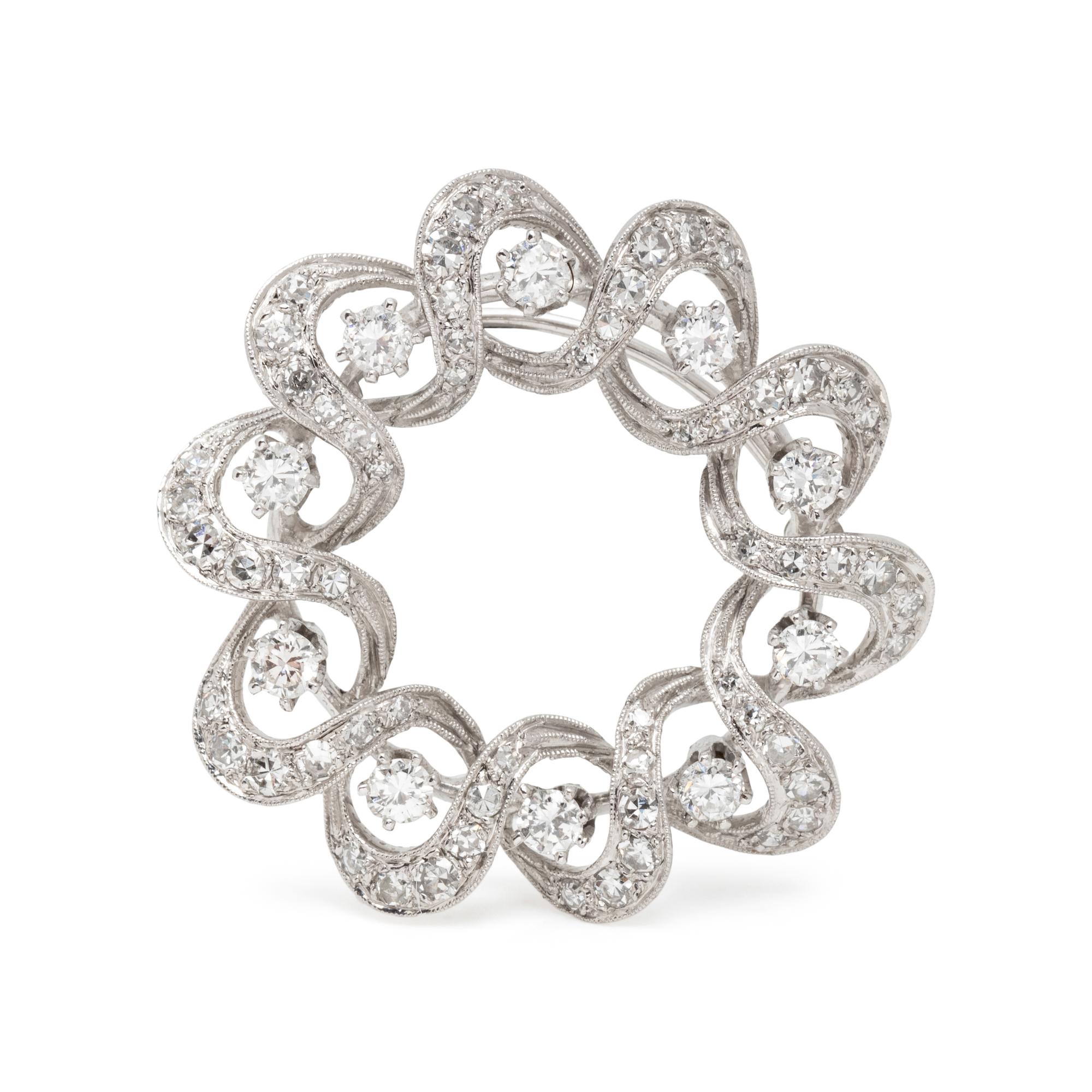 PLATINUM AND DIAMOND CIRCLE BROOCH/PENDANT