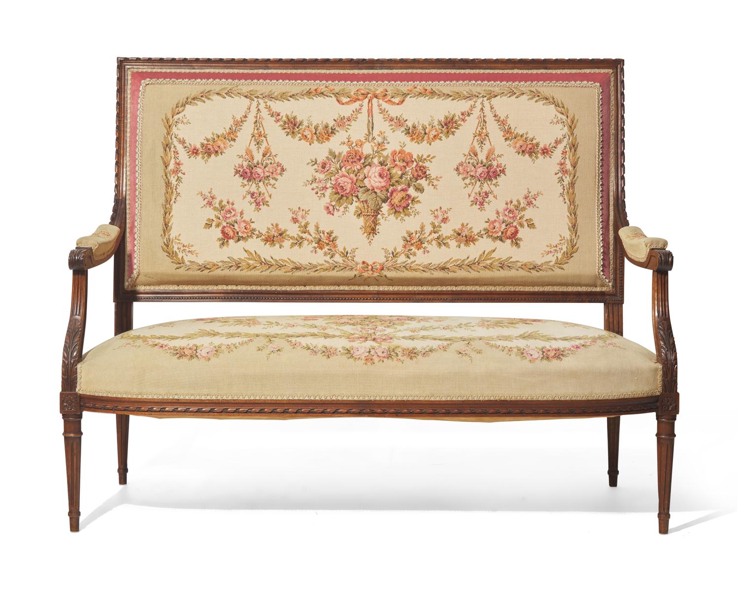 A Louis XVI Style Carved Mahogany Canapé