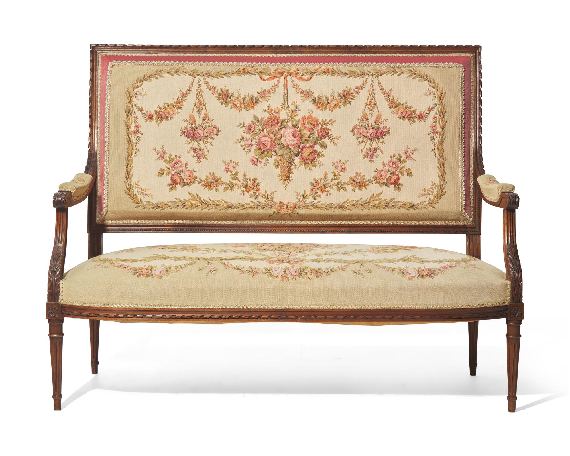 A Louis XVI Style Carved Mahogany Canapé