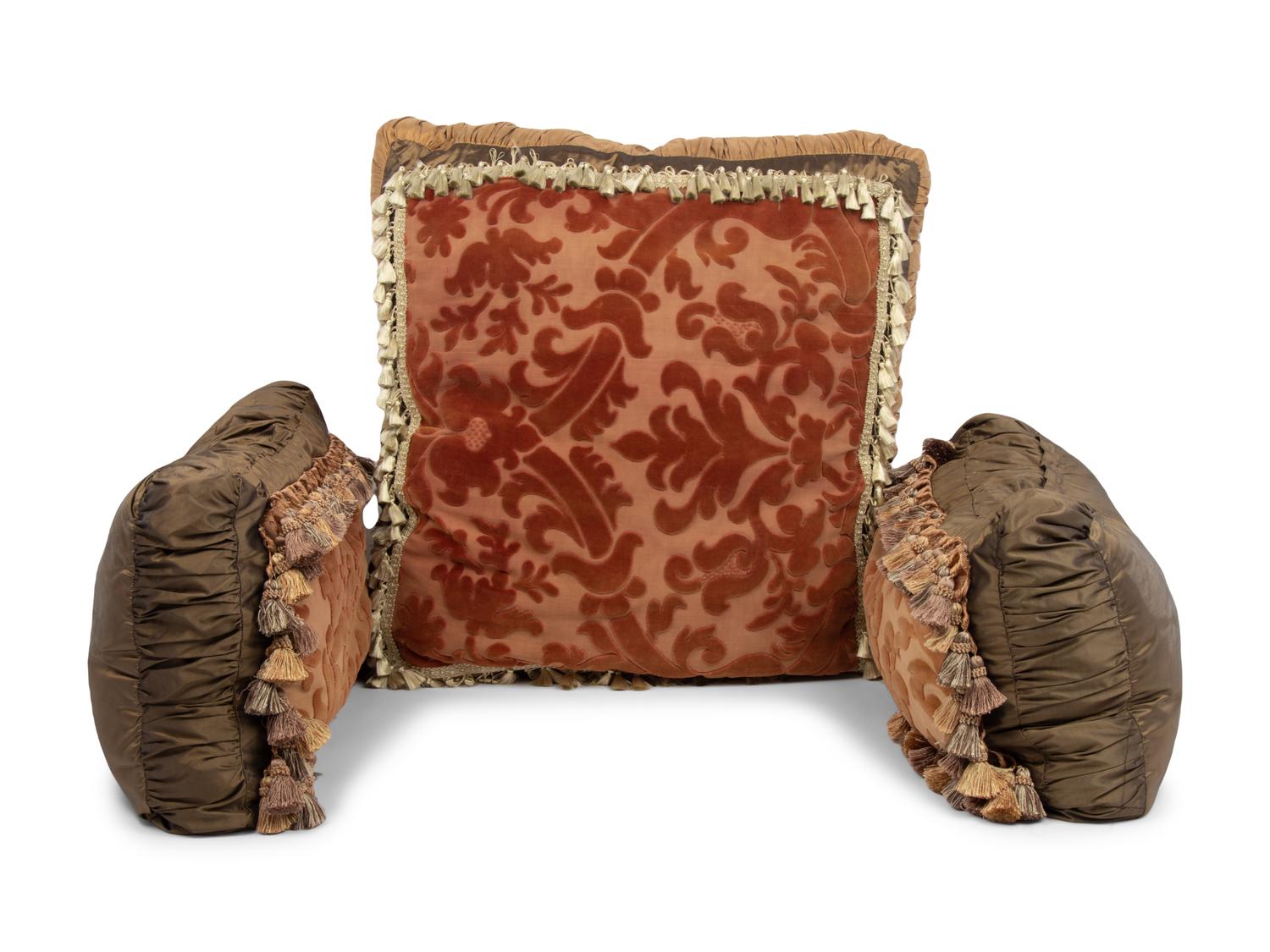 A Set of Three Velvet Upholstered Pillows with Tassels