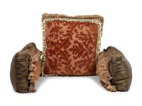 A Set of Three Velvet Upholstered Pillows with Tassels