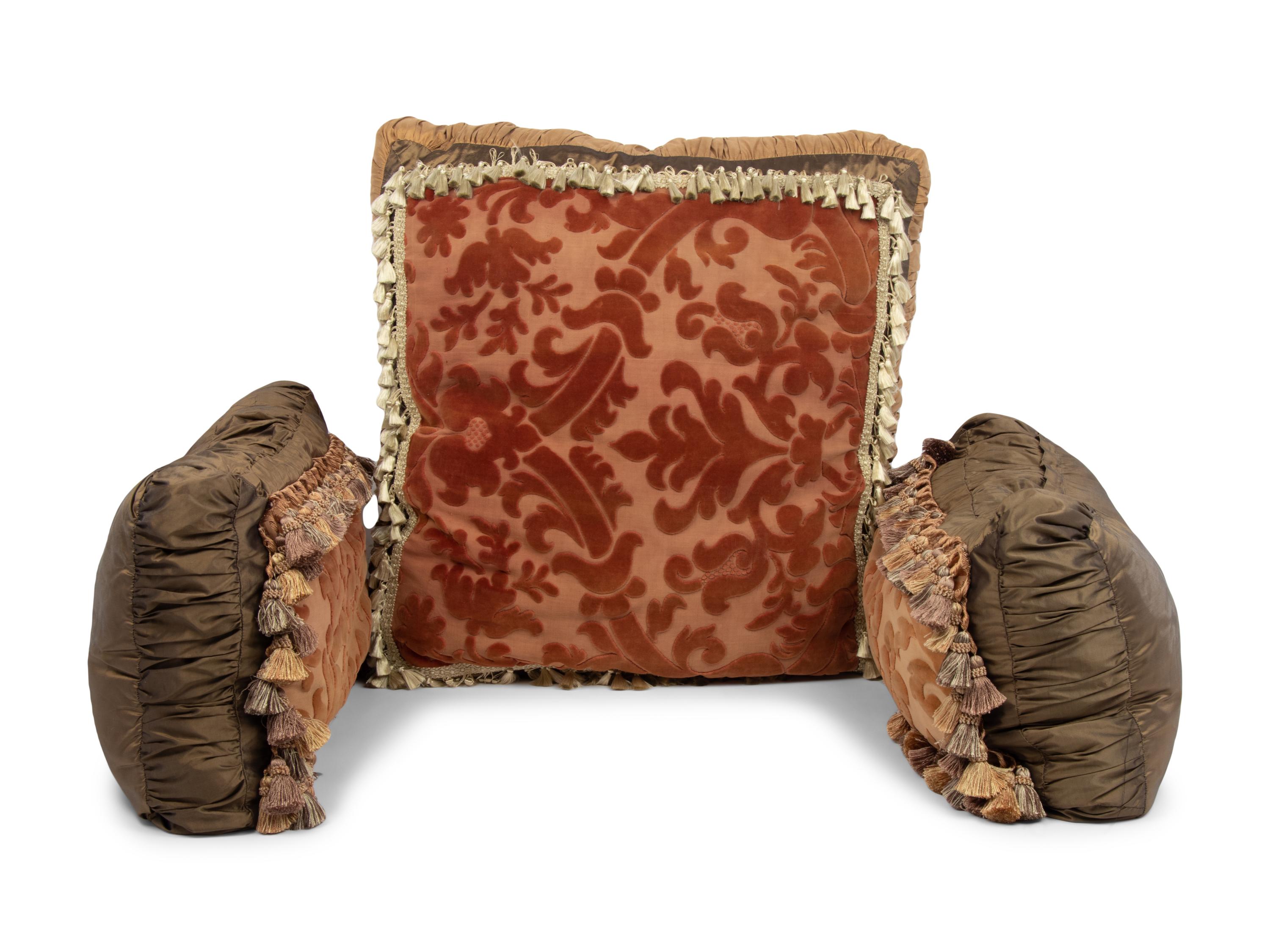 A Set of Three Velvet Upholstered Pillows with Tassels