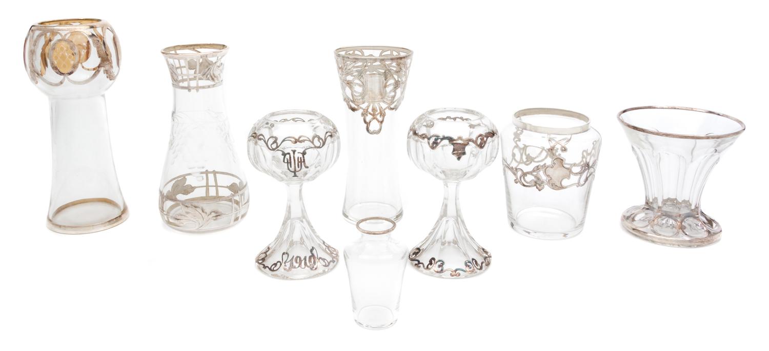 A Group of Eight Silver Overlay Glass Vases Height of tallest 6 7/8 inches.