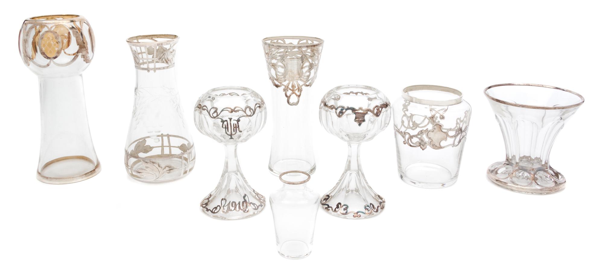 A Group of Eight Silver Overlay Glass Vases Height of tallest 6 7/8 inches.