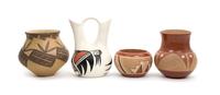 Four Southwestern Pottery Jars First height 8 inches.