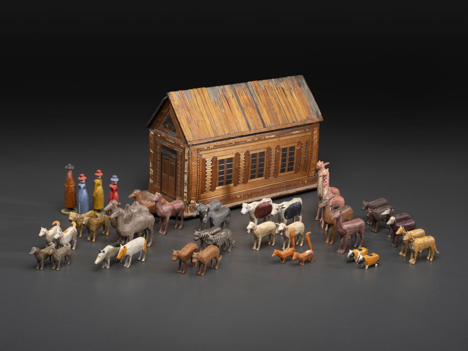 A Carved Wood and Applied Straw Work Noah's Ark with Slide-Front Cover