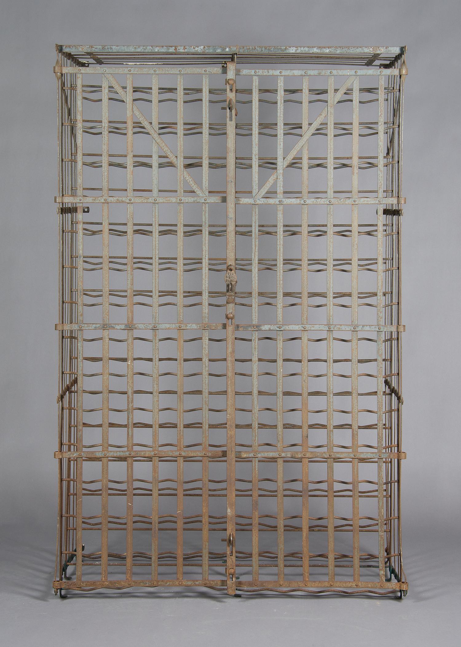 A French Iron Wine Vault, Height 64 1/4 x width 40 x depth 22 inches.