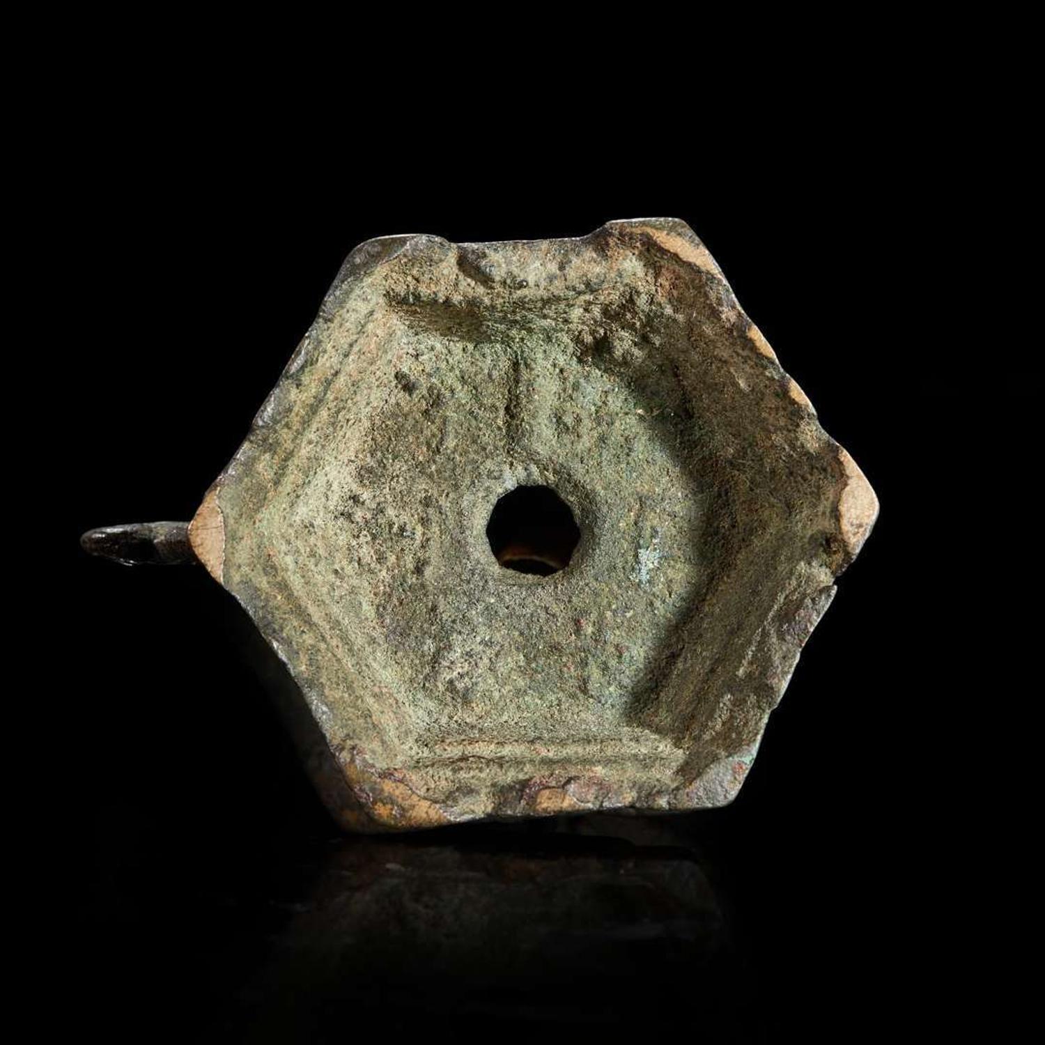 A small bronze "Buddhist Lions" group