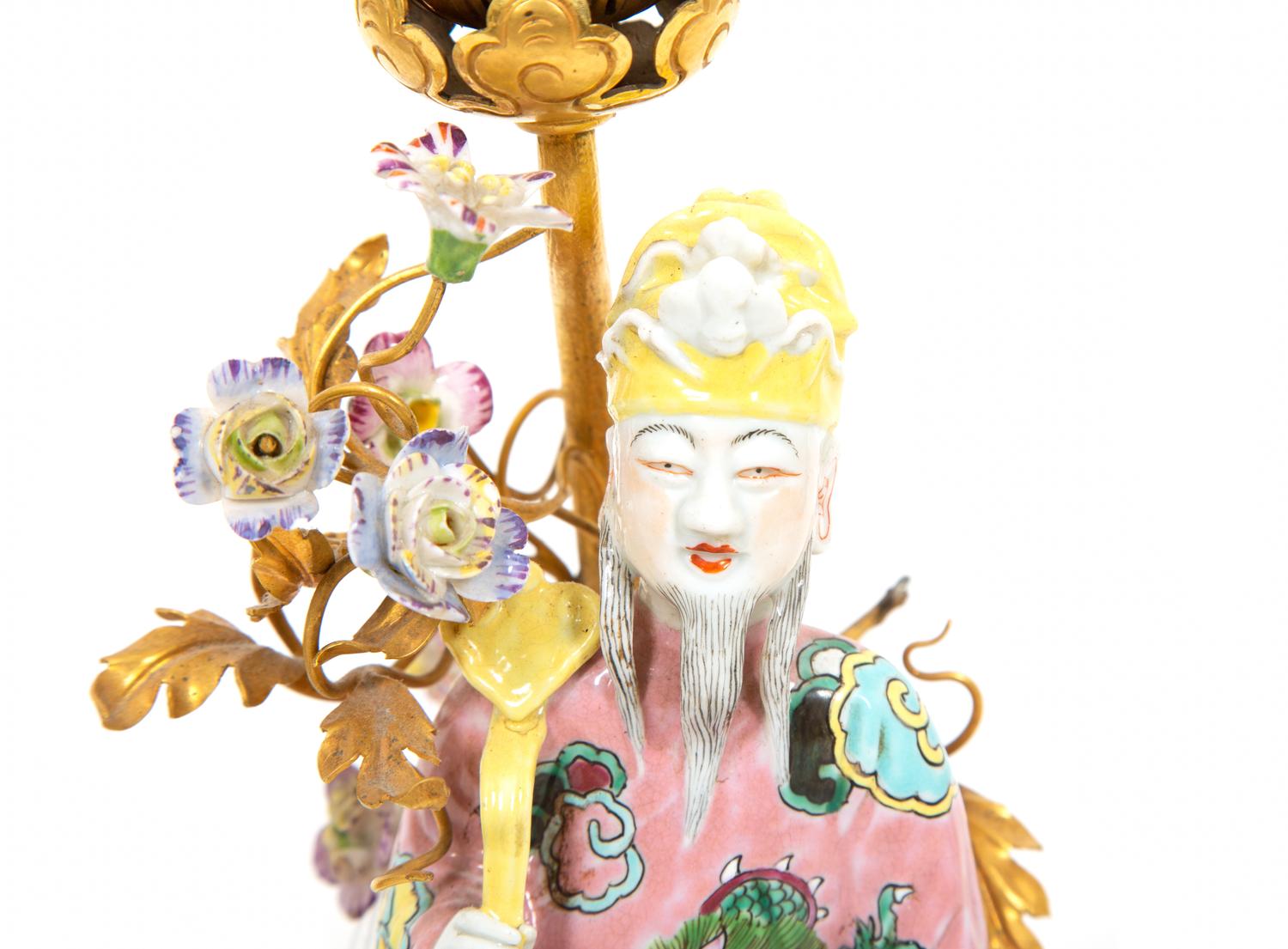 A Pair of Chinese Export Gilt Bronze Mounted Porcelain Figural Lamps