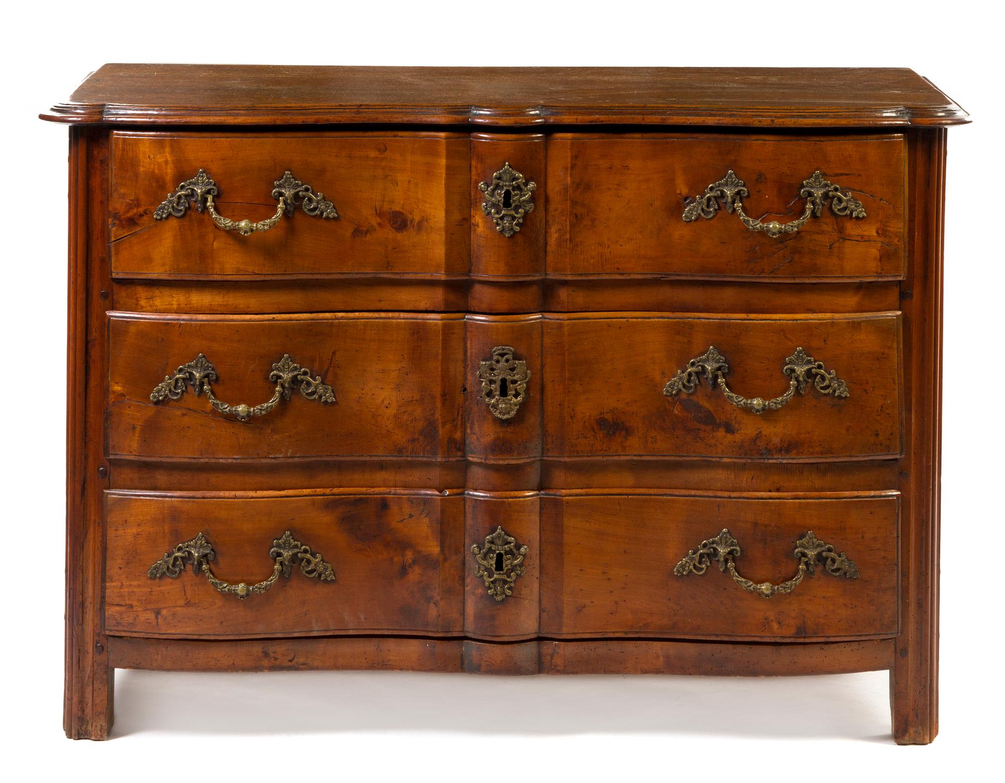 A Louis XVI Style Provincial Walnut Commode, Height 35 1/2 x width 52 1/2 x depth 25 1/4 inches.