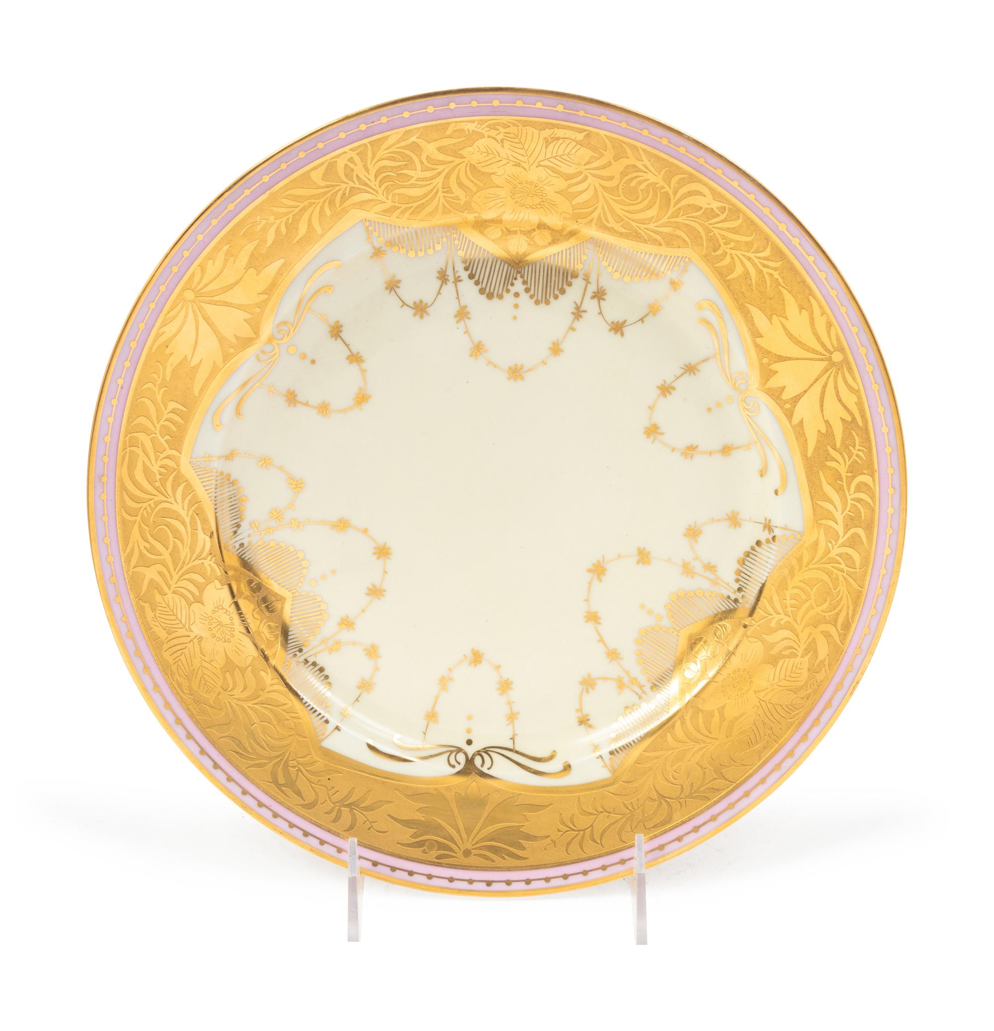 A Set of Twelve French Porcelain Service Plates