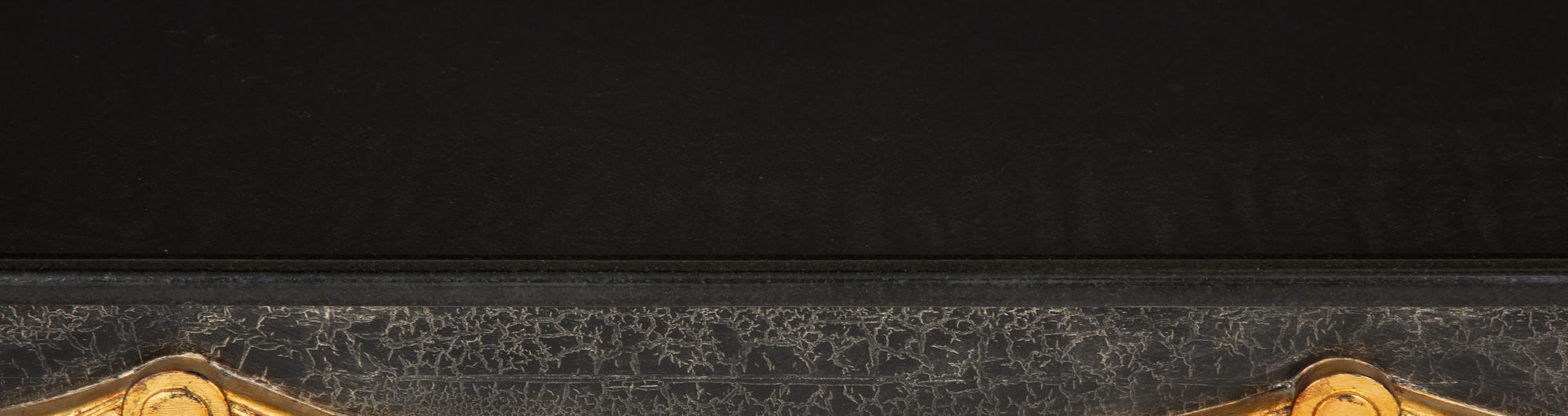 An Ebonized Console Table with Granite Top and Gilt Swag Motif