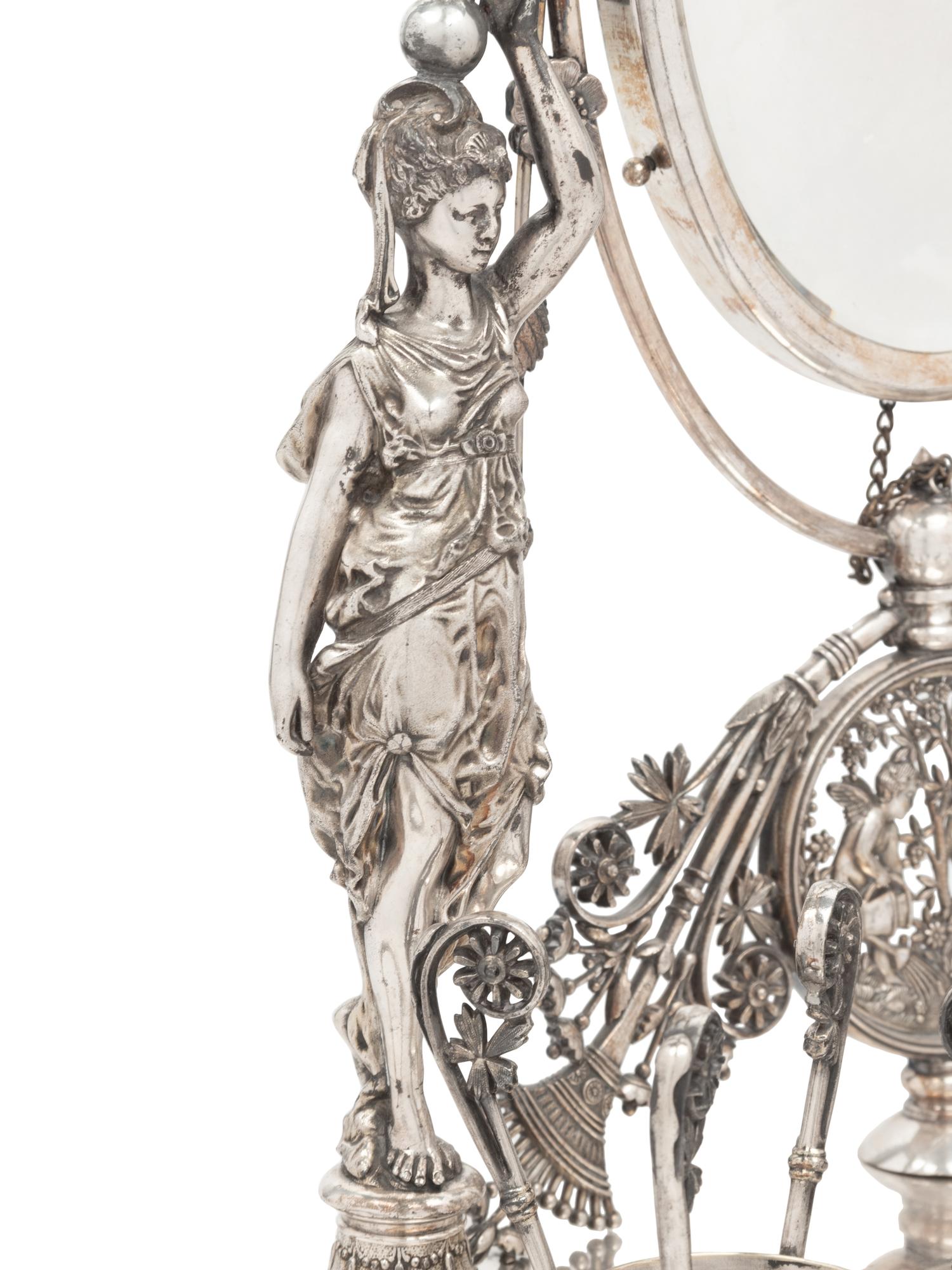 An American Silvered Bronze Figural Vanity Toilet Set