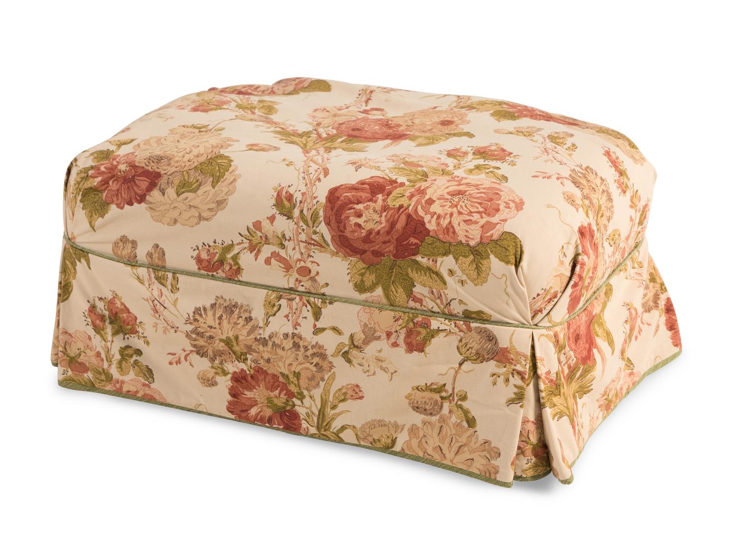Two Chintz Slip-Covered Armchairs and an Ottoman