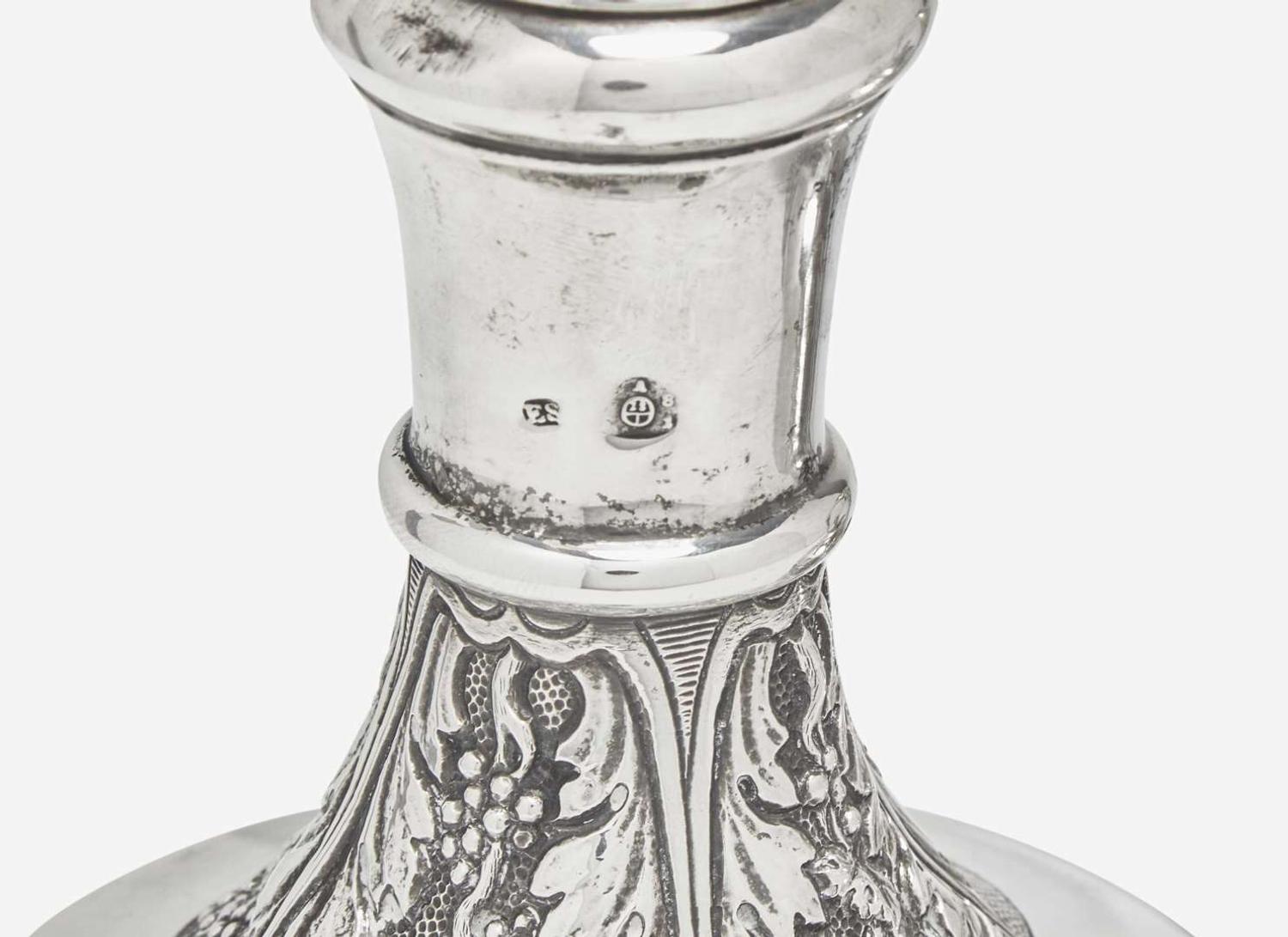 A Continental repoussé silver carafe and a sterling silver teapot, the teapot by Tiffany & Co., New York, NY, 1873-1891