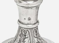 A Continental repoussé silver carafe and a sterling silver teapot, the teapot by Tiffany & Co., New York, NY, 1873-1891
