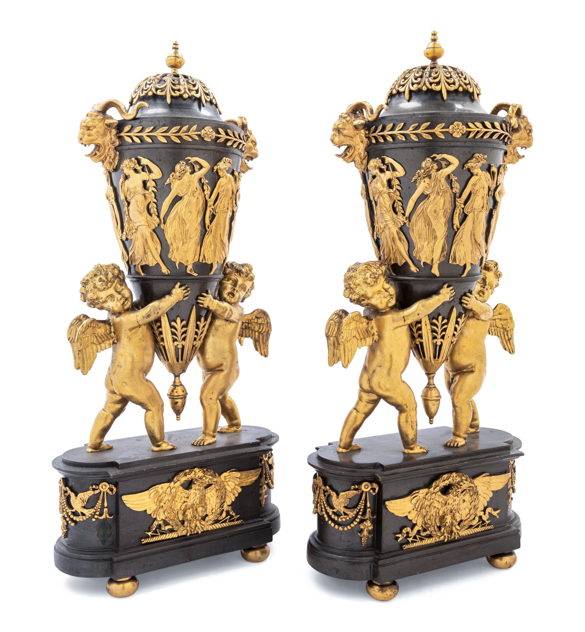 A Pair of Directoire Revival Gilt and Patinated Bronze Urn Ornaments