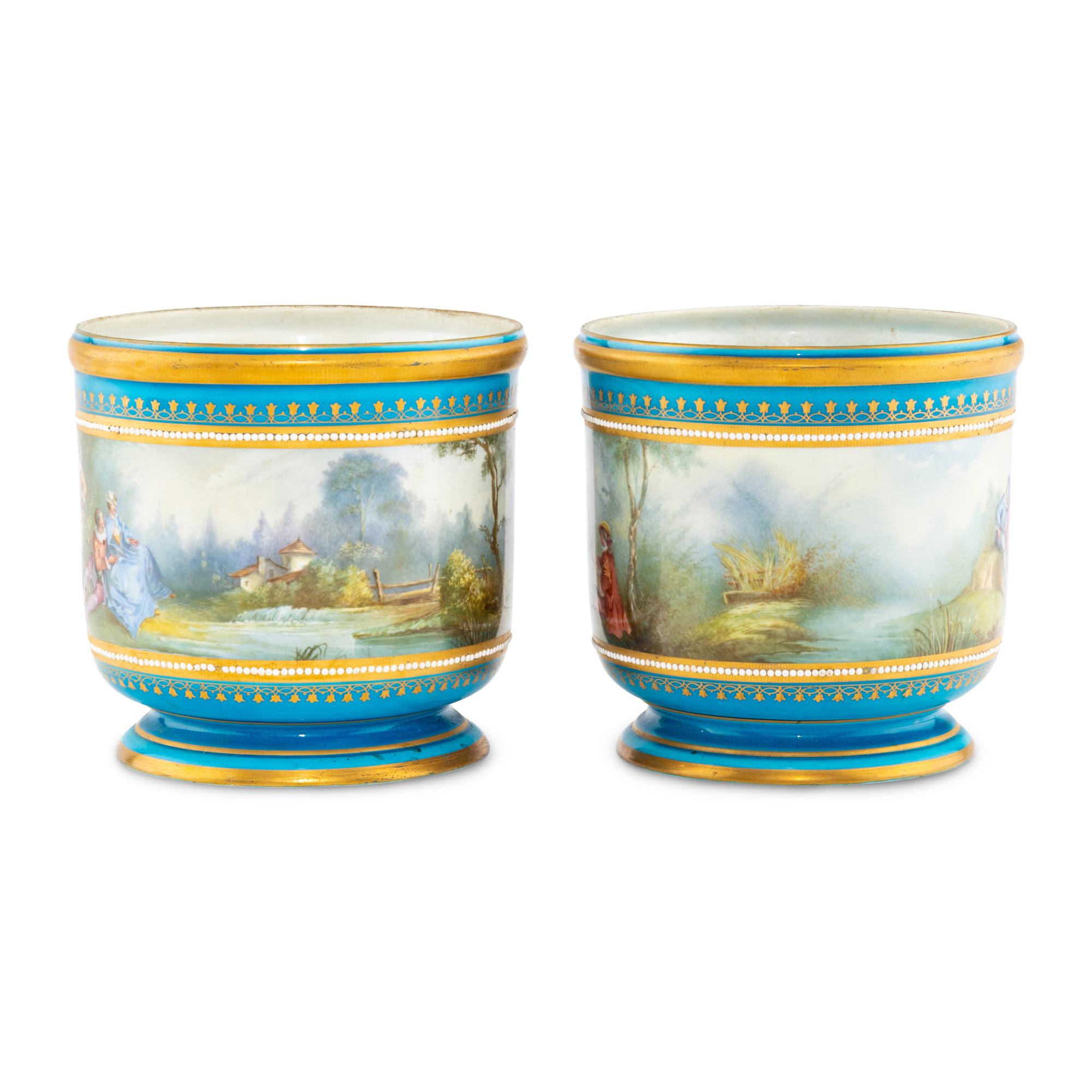 A Pair of Sèvres Style Porcelain Cache Pots