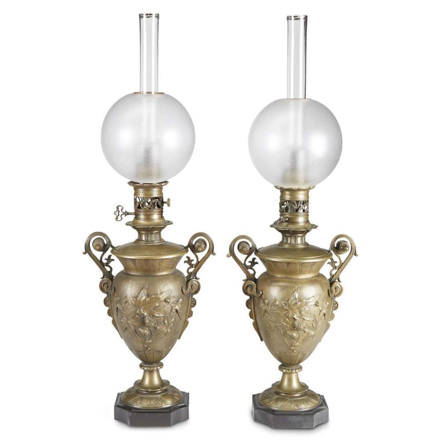 Pair of French bronze 'Carcel' lamps 19th century