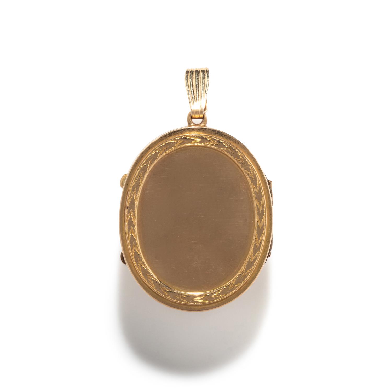 A Neoclassical Gold and Agate Cameo Locket with the God Silenus wearing an Ivy Crown