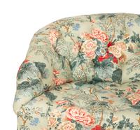 A Button-Tufted Floral Chintz Sofa