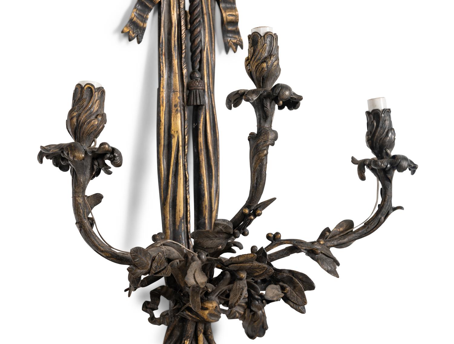 A Pair of Large Louis XVI Style Bronze Seven-Light Sconces