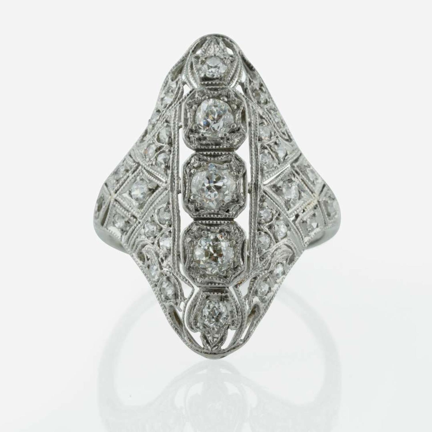 An Art Deco Platinum and Diamond Ring