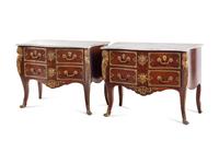 A Pair of Régence Style Gilt Bronze Mounted Marble-Top Commodes