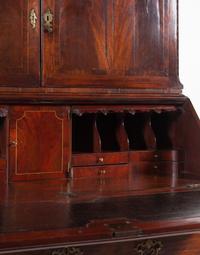 A George III Carved Mahogany Slant-Front Secretary Desk in the Chippendale Taste