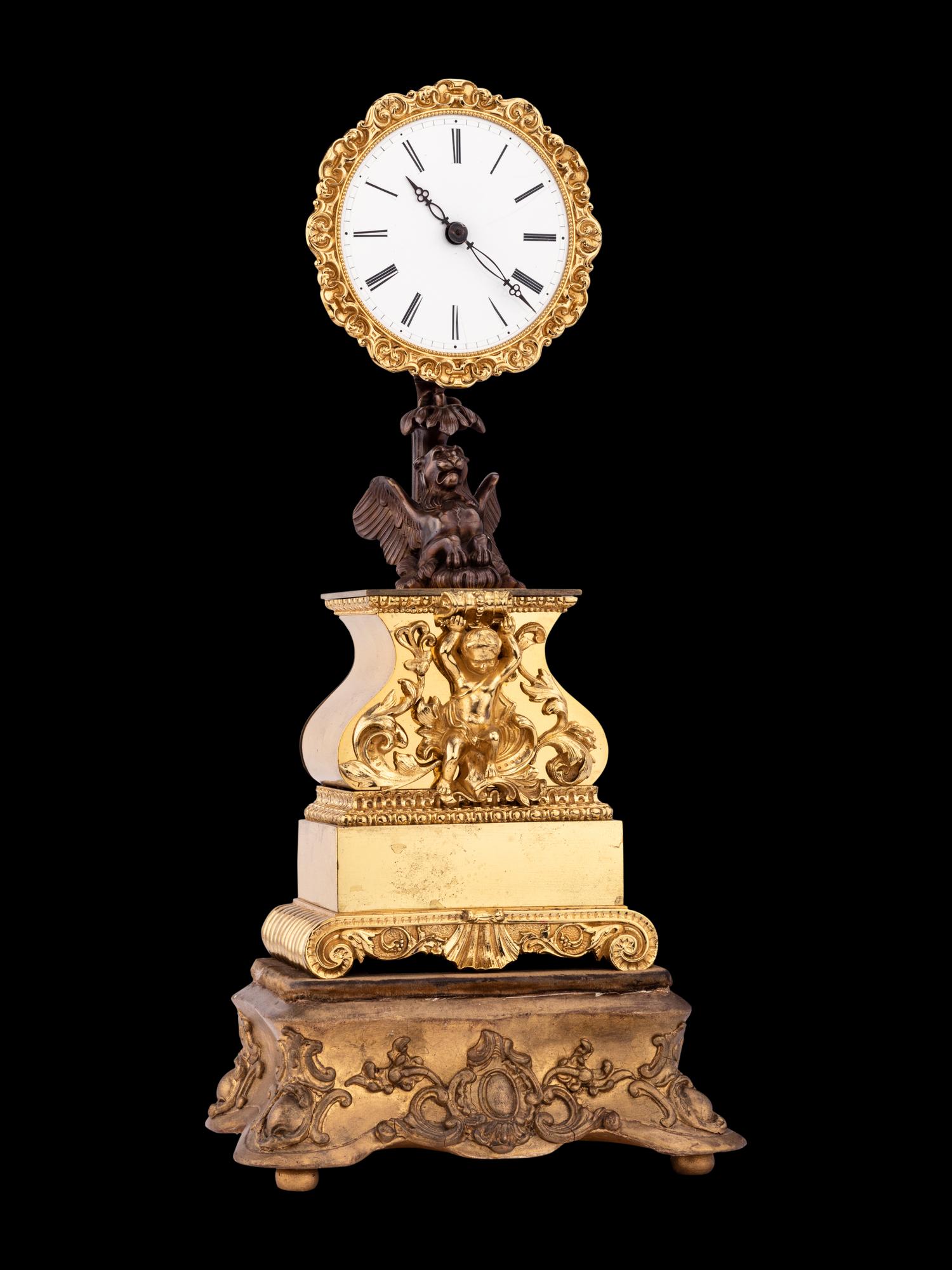 A French Gilt and Patinated Bronze Mystery Clock, with Wood Base, Attributed to Jean Eugene Robert Houdin