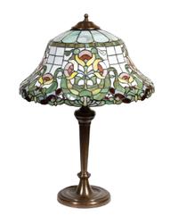 An American Leaded Glass Table Lamp Diameter of shade 19 inches, height overall 27 1/2 inches.
