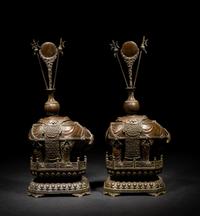 A Pair of Chinese Bronze Figures of Elephants