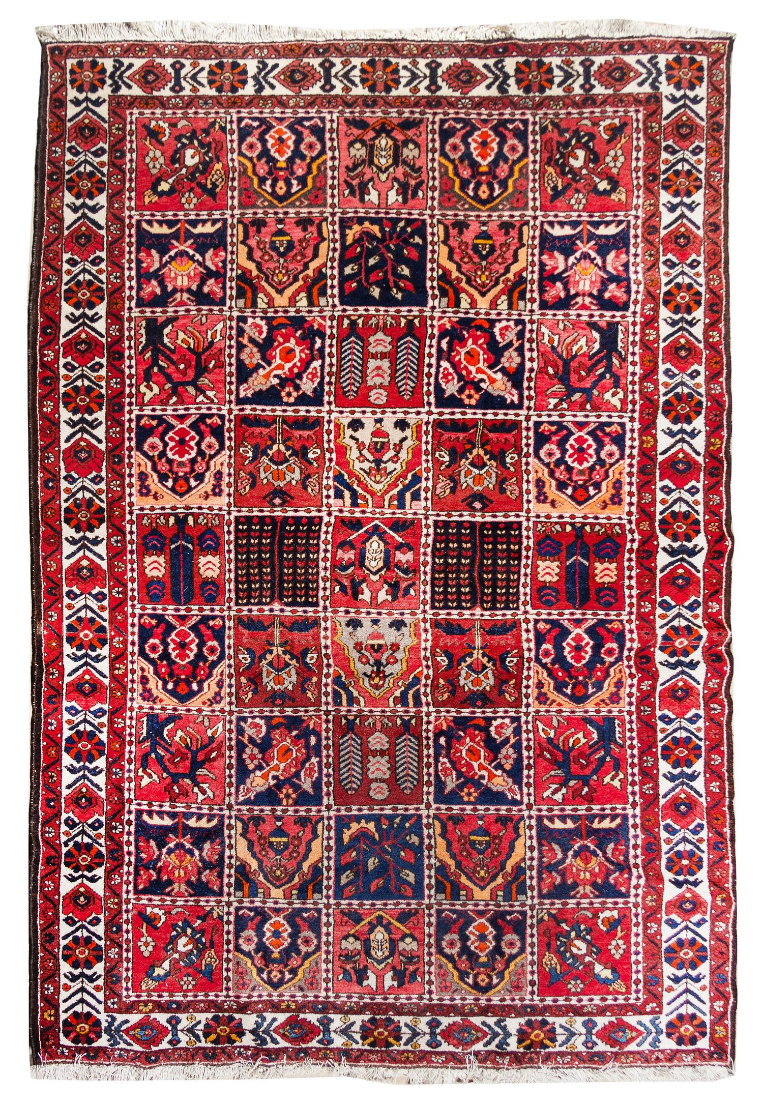 A Bakhtiari Wool Rug Approximately 7 feet x 10 feet. — CIRCA 1930s