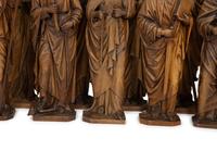 A Set of Twelve Continental Carved Walnut Figures of Apostles