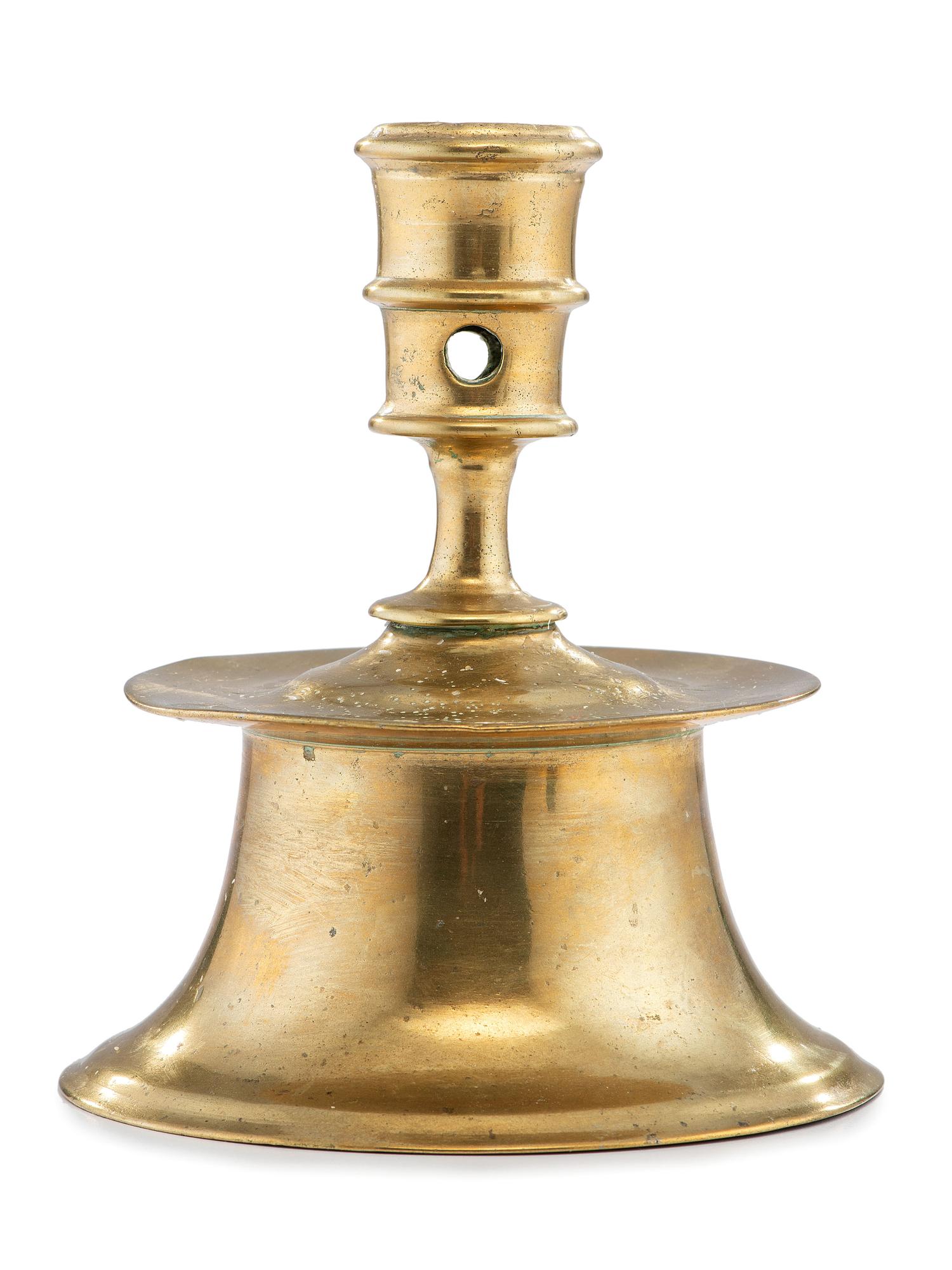 A Continental Brass Heemskerk Candlestick