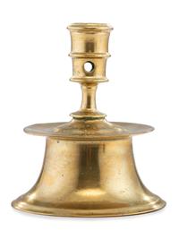 A Continental Brass Heemskerk Candlestick