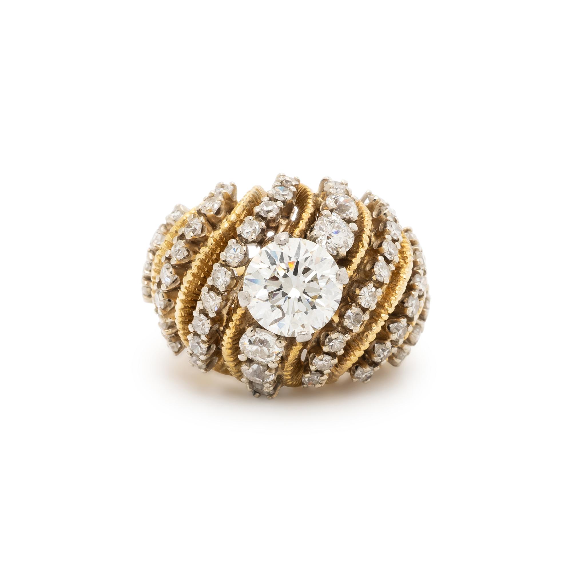 HAMMERMAN BROTHERS, DIAMOND, PLATINUM, AND YELLOW GOLD BOMBÉ RING