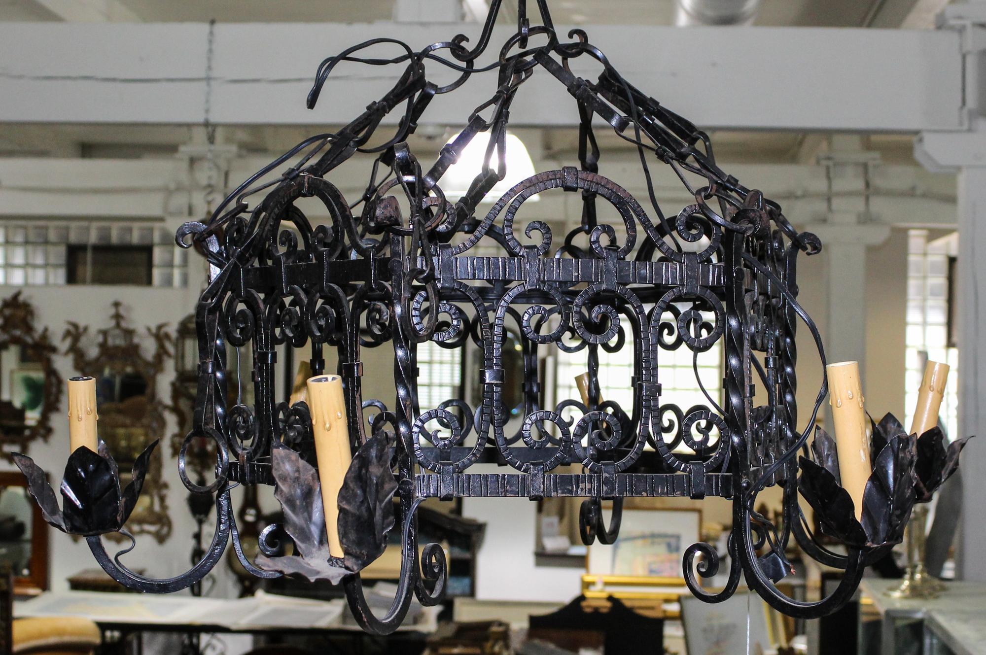 Two Wrought Iron Light Fixtures Diameter of largest 30 1/2 inches. — LATE 19TH/EARLY 20TH CENTURY