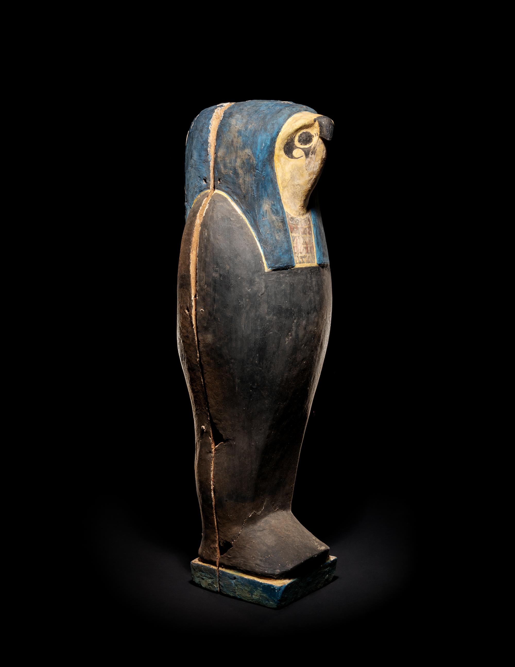 An Egyptian Wood Falcon Sarcophagus