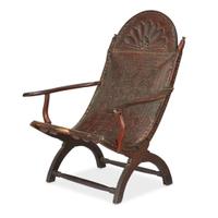 Carved mahogany and embossed leather campeche chair Mexico, first quarter 19th century