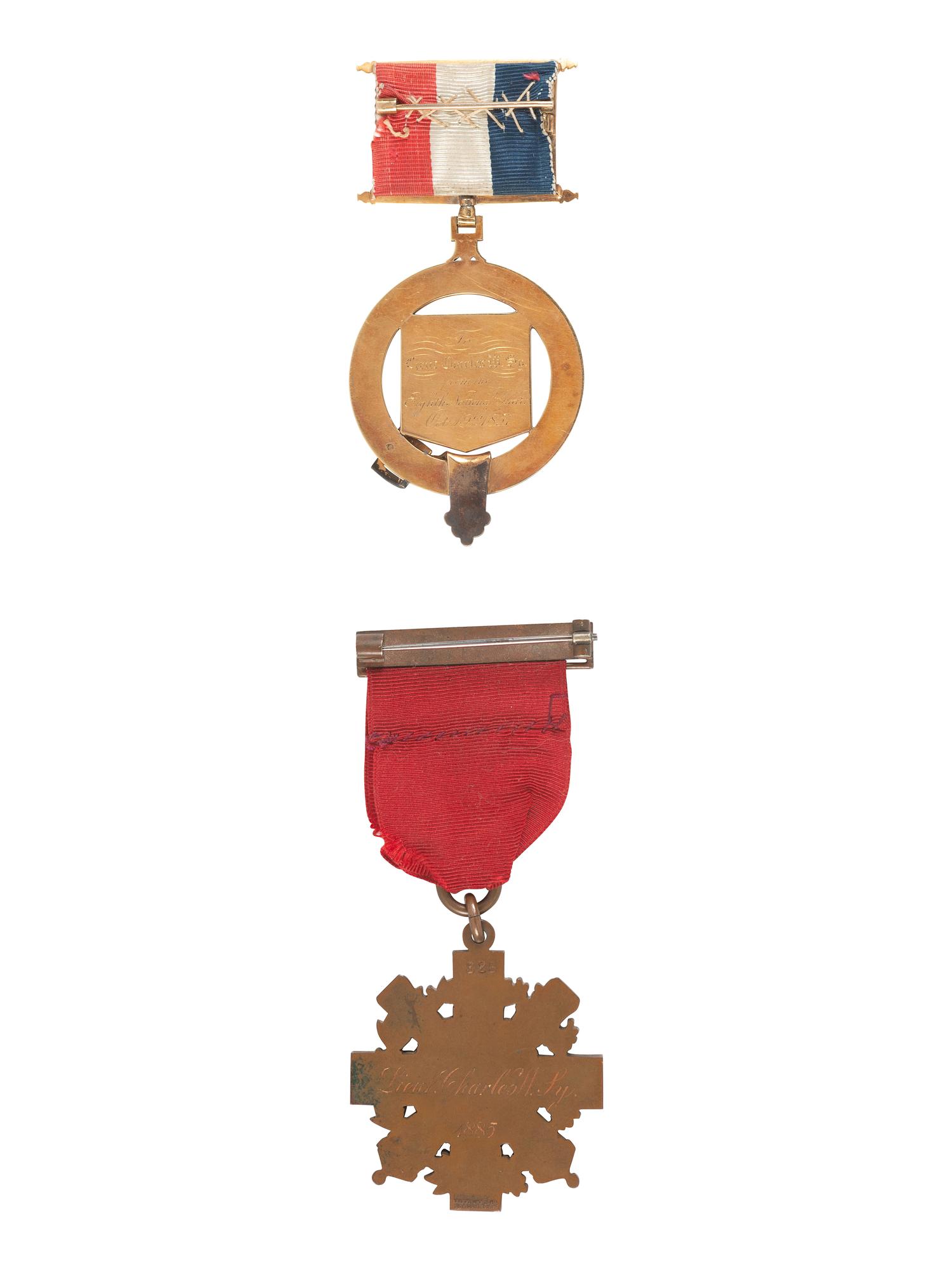 [CIVIL WAR]. Pair of medals presented to Lieutenant Charles W. Sy, including NY Faithful Service medal and pre-war gold regimental medal from the 8th NY National Guard.