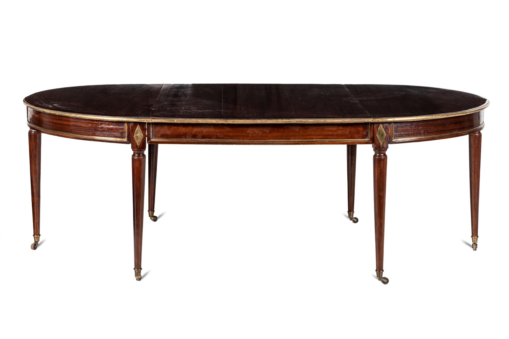 A Directoire Brass Mounted Mahogany Dining Table