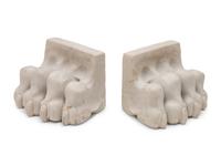 A Pair of Composition and Bronze Paw and Foot Form Doorstops