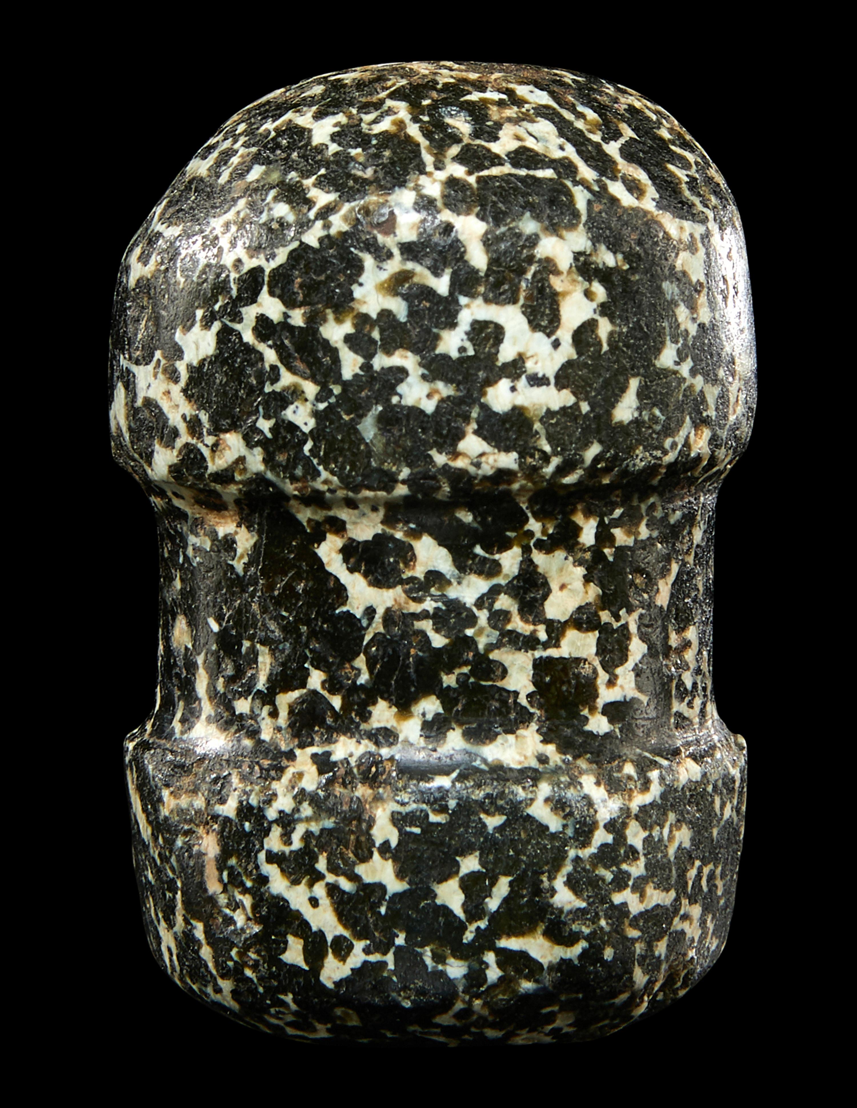 An Egyptian Diorite Pestle and Mace Head
