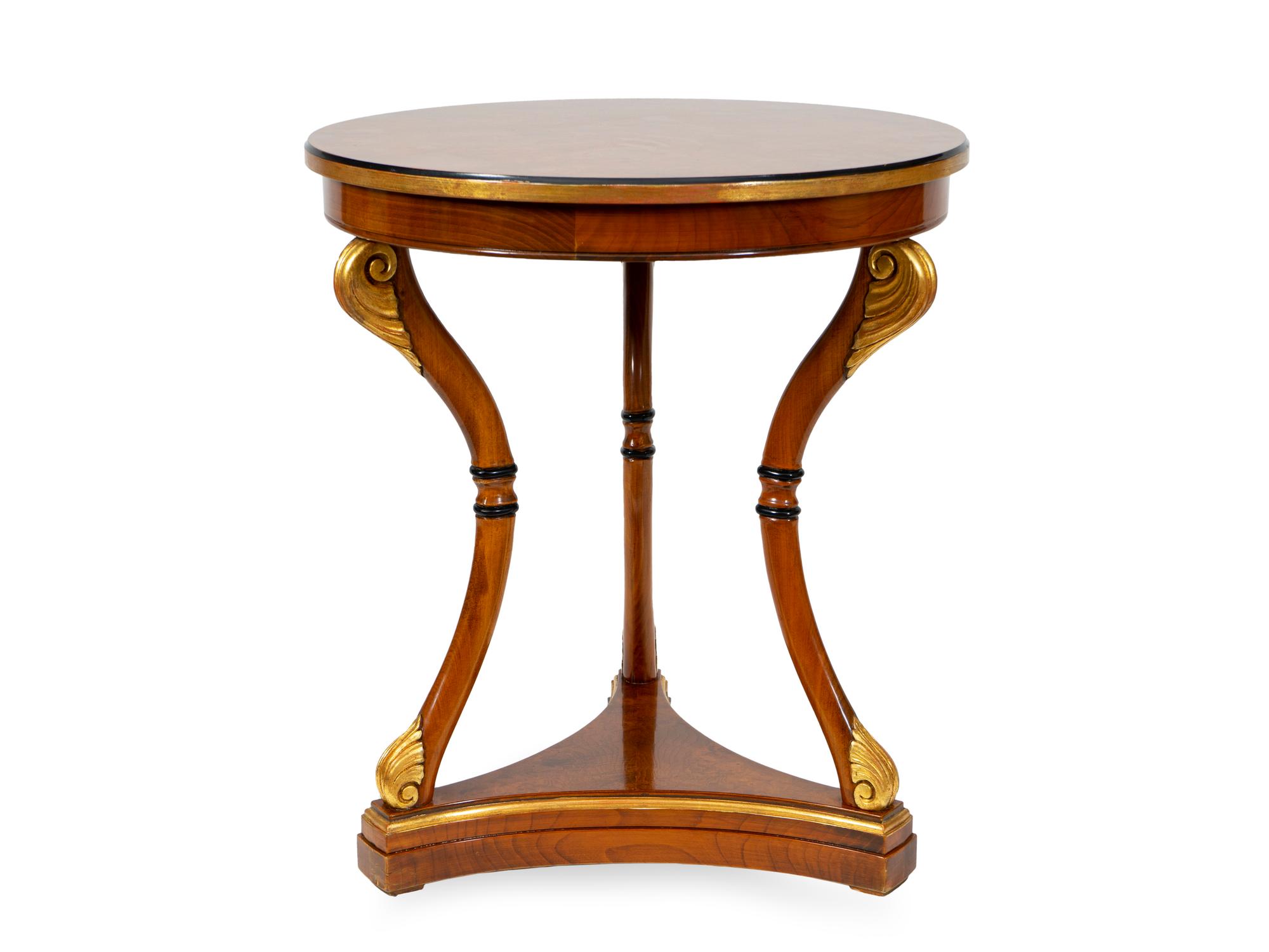 A French Empire Style Mahogany and Parcel Gilt Side Table — 20TH CENTURY