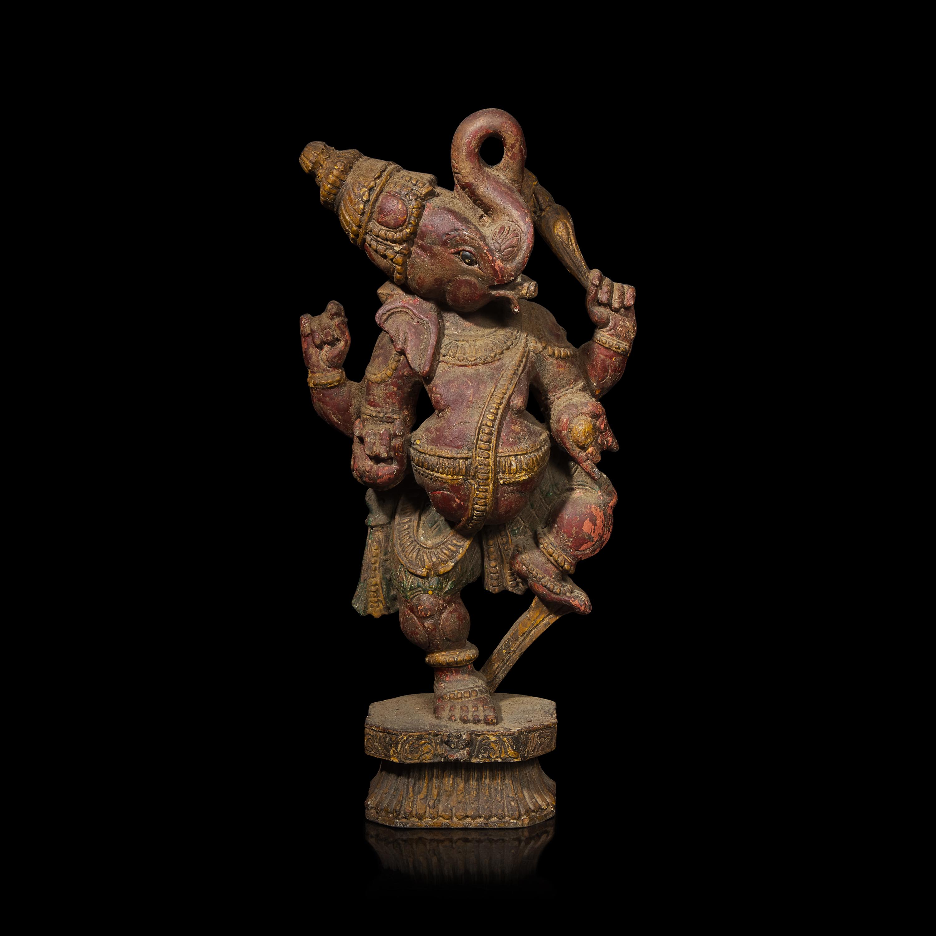 An Indian Carved and Polychromed Wood Figure of Ganesh, Late 19th to Early 20th Century